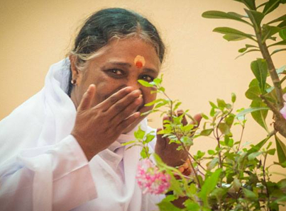 Amma smelling tulsi